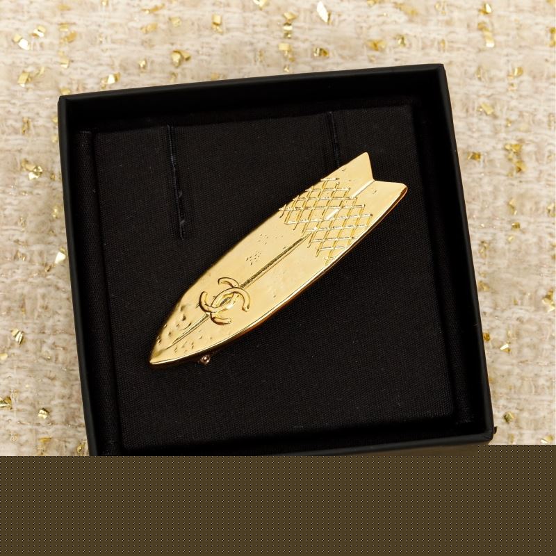 Ch*el brooches